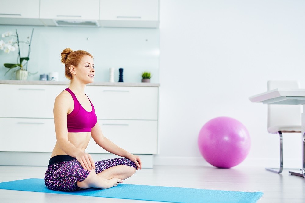 woman meditating at home