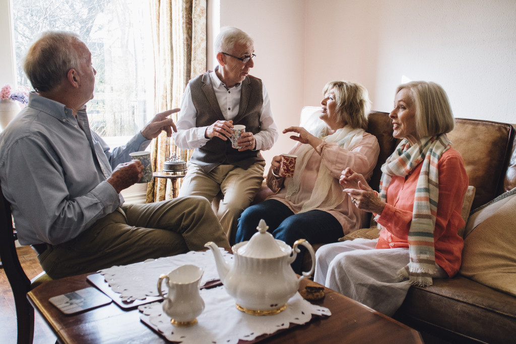 old people having a tea party