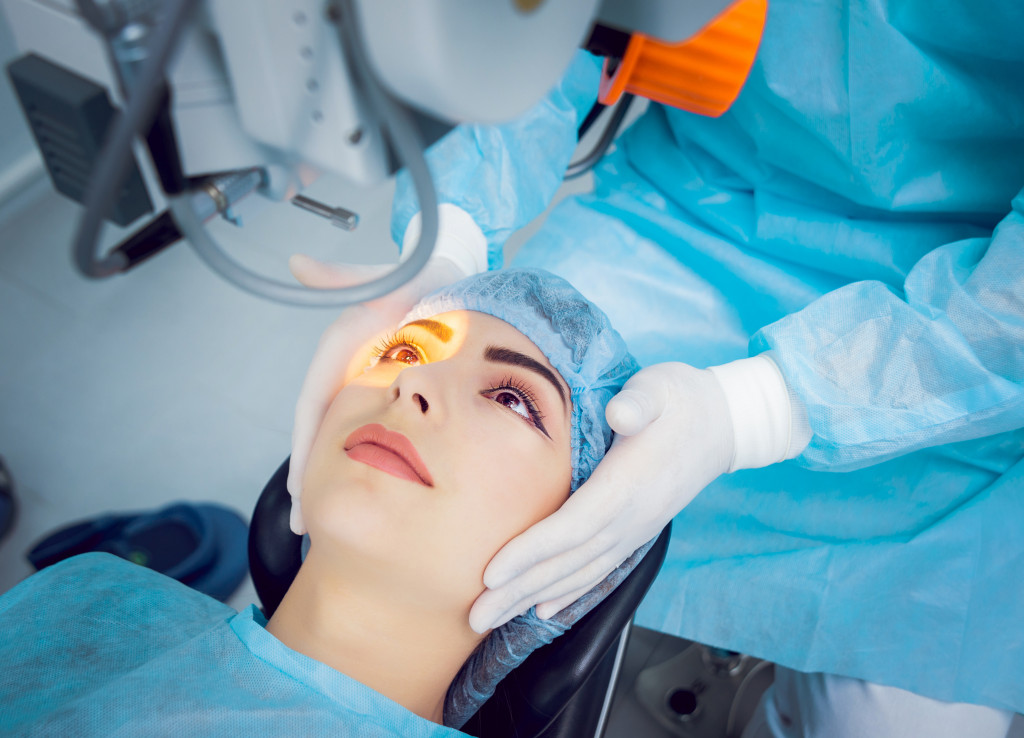 a patient looking at a laser during an eye surgery