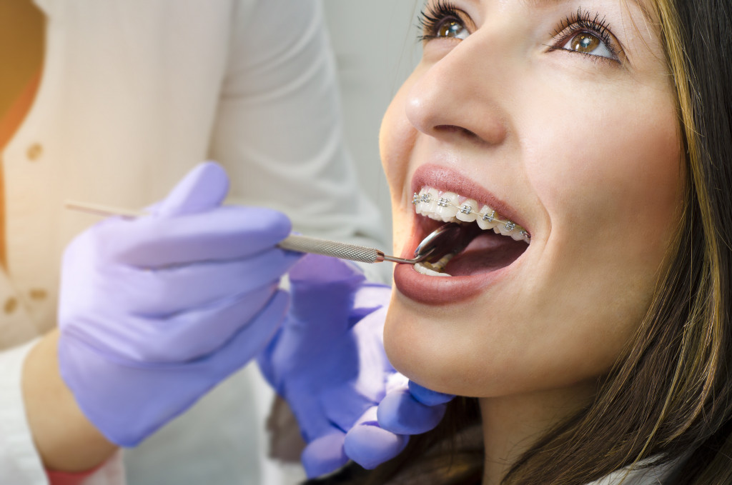 a woman in a dental appointment