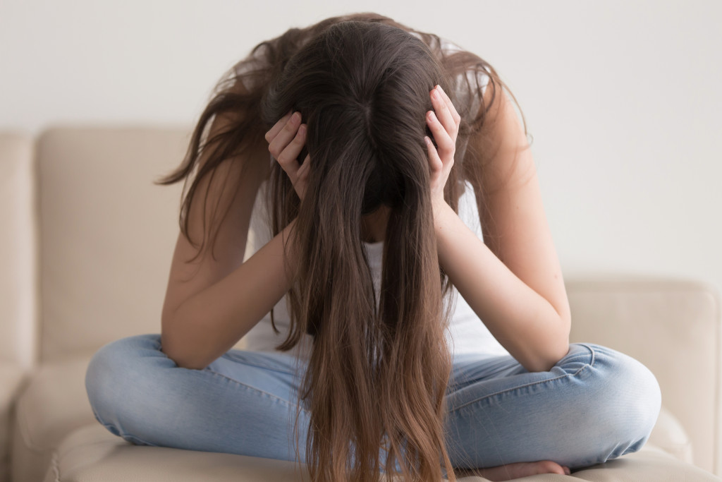 A woman experiencing mental health problems