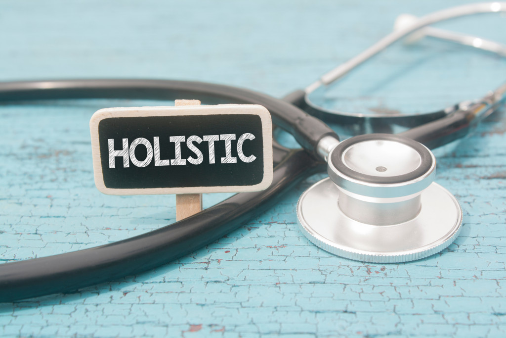 the word holistic in a stethoscope