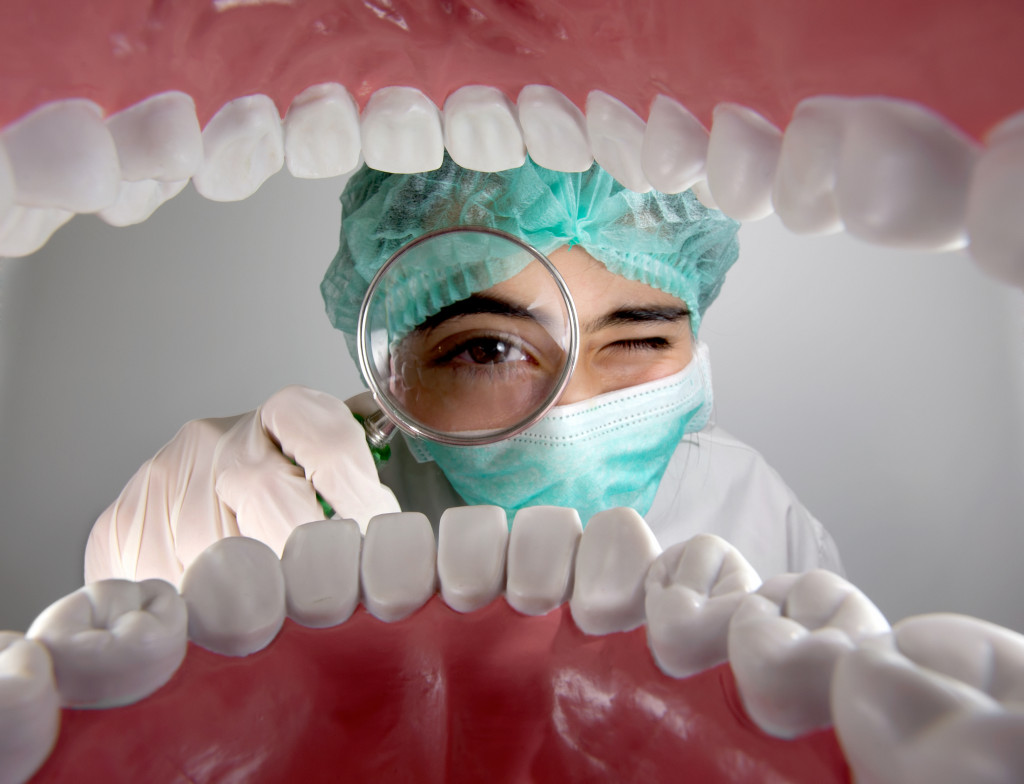 dentist checking the Mouth inner POV