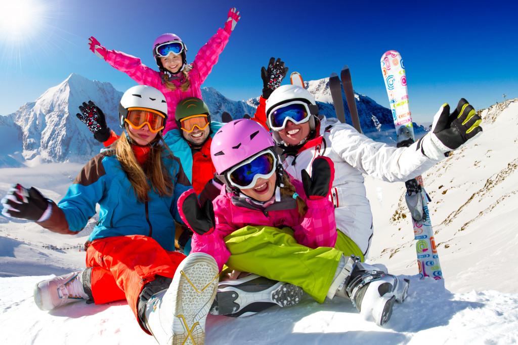 family skiing during winter vacation