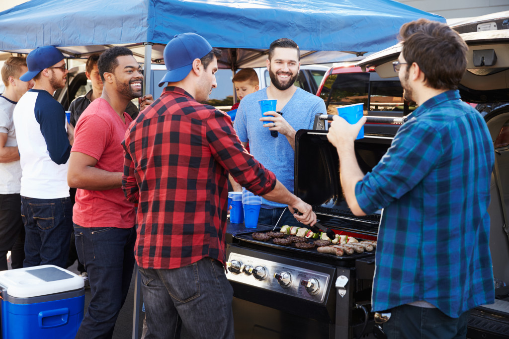 Family and friends enjoying a barbecue at home.