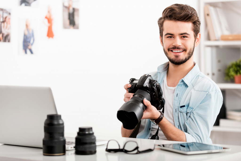 smiling male photographer