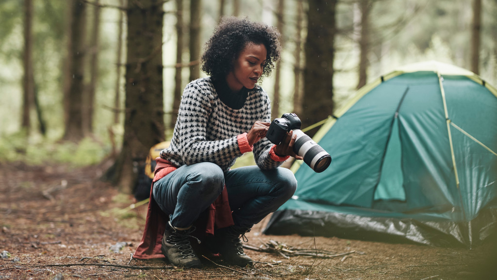 female photographer in the forest