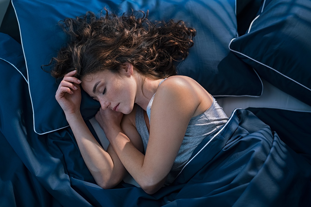 A woman sleeping in bed