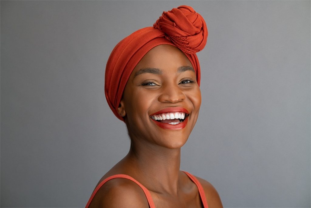 happy smiling woman with headscarf